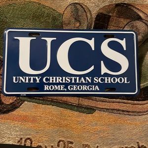Vintage 1986 UCS Unity Christian School Rome, GA Metal License Plate NOS NEW